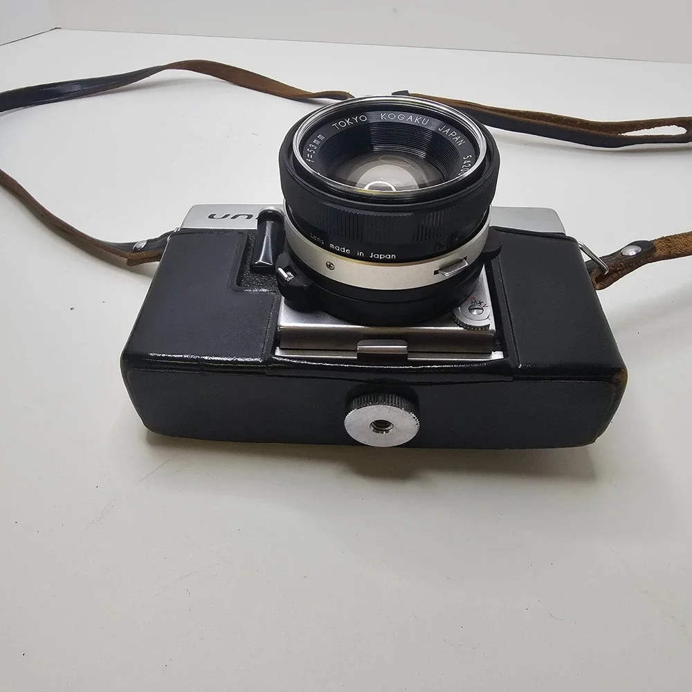Vintage Topcon Uni 35mm SLR Camera with UV Topcor 53mm f2 Lens and Case Untested